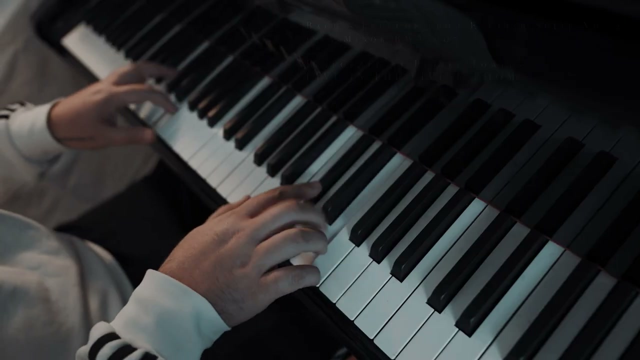 Hands on piano keys